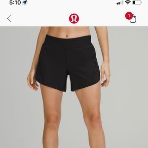 Lululemon mid rise track that short 5in